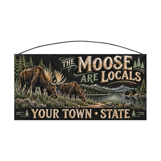 Personalized The Moose Are Locals wood sign, 7 x 14 in — Bull moose and calf grazing by a mountain lake, with your town and state