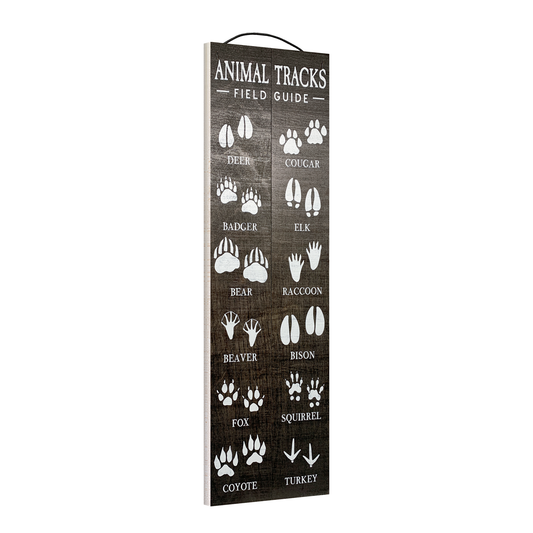 Angled view of the Animal Tracks Field Guide 5 x 16 wood sign, showing the board thickness and wire hanger