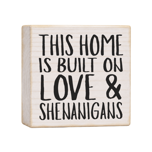 This Home Is Built on Love & Shenanigans Wood Block Sign, 4×4 — solid pine