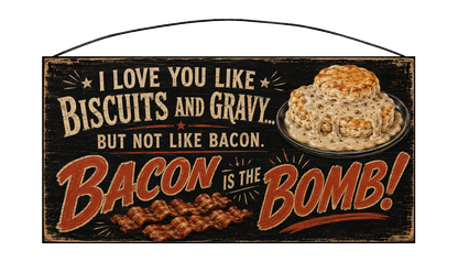 Front of wire-hanger pine sign with biscuits, gravy, and bacon artwork.