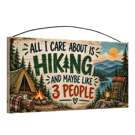 All I Care About Is Hiking Campsite Wood Sign, 7×14 — angled view, solid pine