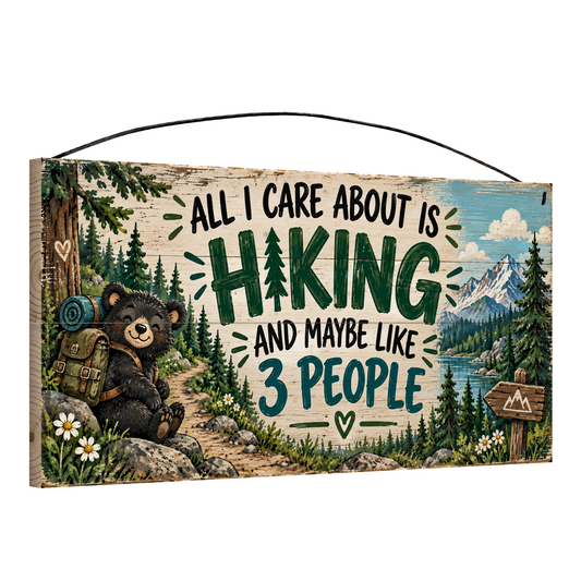 All I Care About Is Hiking Bear Cub Wood Sign, 7×14 — angled view, solid pine