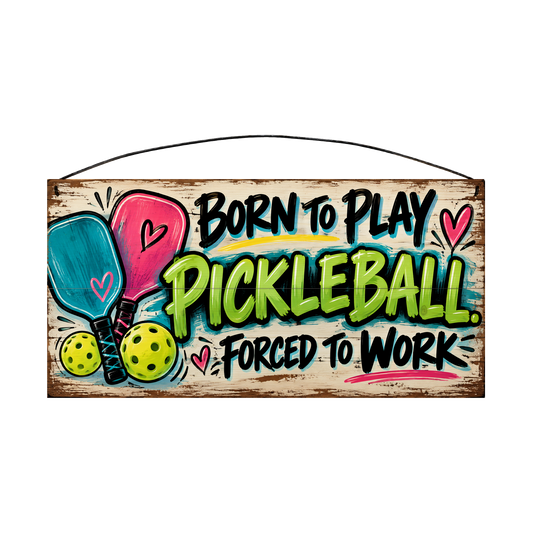 Born to Play Pickleball Forced to Work wood sign, 7 x 14 in, black and lime-green brush lettering with crossed pickleball paddles, whitewashed pine