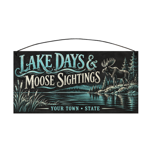 Personalized Lake Days & Moose Sightings wood sign, 7 x 14 in — Moose on a lakeshore with cattails, with your town and state