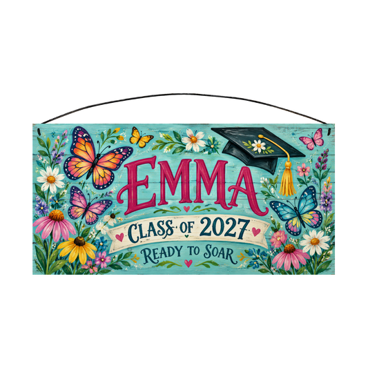 Personalized Ready to Soar graduation wood sign, 7 x 14 in — bright monarch and blue butterflies with wildflowers and a graduation cap, on a turquoise board with bold pink name lettering