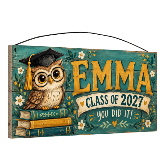 Angled view of the personalized You Did It! graduation 7 x 14 in pine wood sign, showing the board thickness and wire hanger