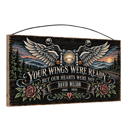 Angled view of the personalized Your Wings Were Ready motorcycle memorial 7 x 14 in pine wood sign, sample name David Wilson 1966 - 2026 in the banner