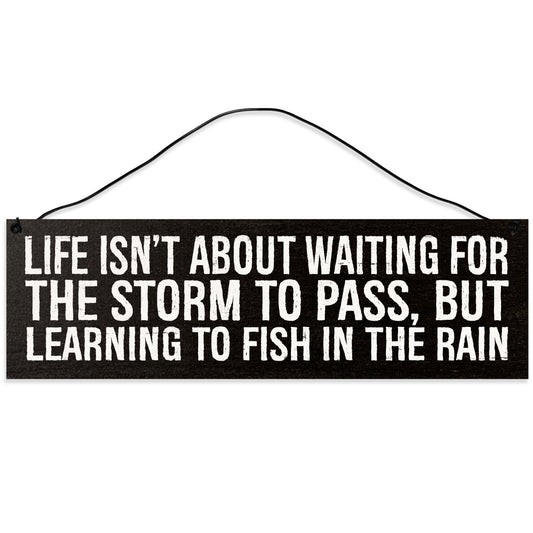 Sawyer's Mill - Life Isn't About Waiting for The Storm to Pass. Wood Sign for Home or Office. Measures 3x10 inches.